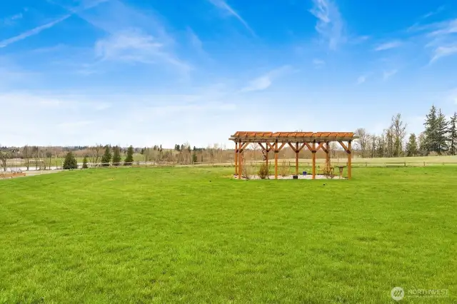 Find serenity in your own private pergola—an idyllic space just steps from the house, perfect for quiet reflection, stargazing, or birdwatching.