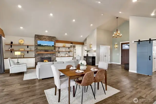 The 15ft vaulted ceilings with enhanced lighting and indoor speakers create a space that lives grand for hosting your large gatherings yet is perfect for those weeknights just cozying up by the fireplace.