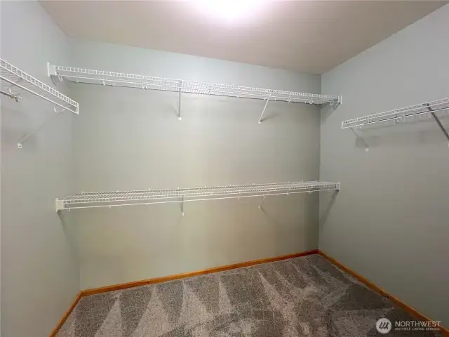 main floor primary bedroom walk-in closet
