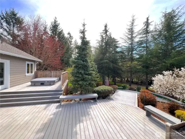 deck with hot tub access from primary bedroom