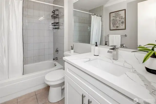 Primary bathroom with new vanity and quartz counter top