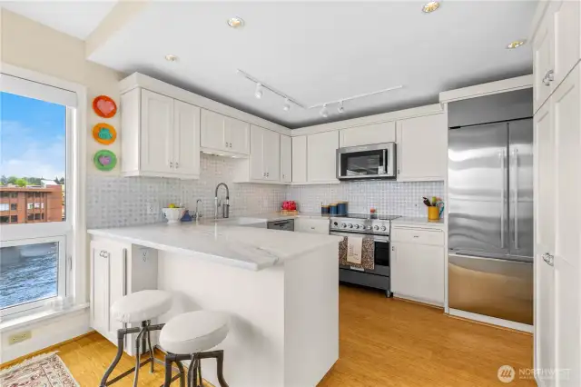 Beautifully remodeled kitchen with marble countertops and all new appliances!