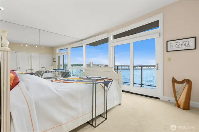 Primary bedroom with its own private balcony.