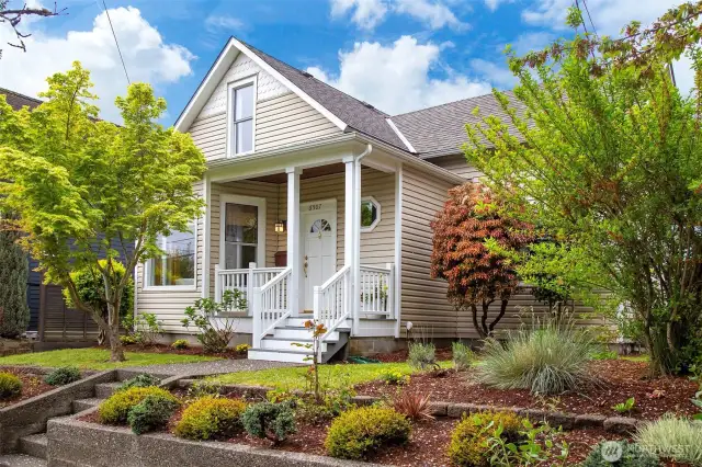 Beautiful cherry tree-lined Earl Ave, mature landscaping, fantastic curb appeal. Charming sitting porch with exposed wood ceiling on quiet street.