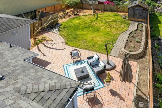 Multiple options for outdoor entertaining, mature landscape, garden beds and flowering trees. Spacious shed for hobby area or tools.