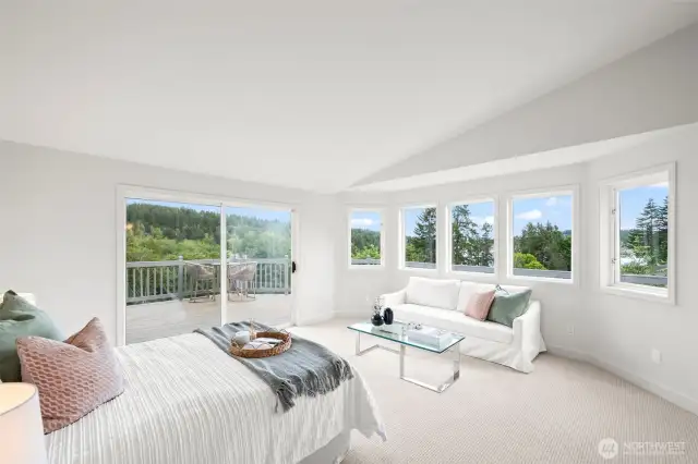 Primary bedroom with lots of light and beautiful windows.