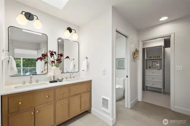 Primary bathroom looks so sharp, and so very tastefully done!