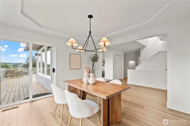 Dining room flows onto the deck.