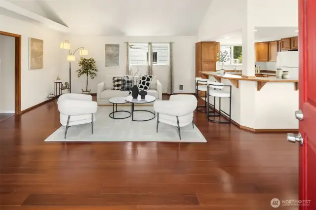 This home offers a great open-concept room with vaulted ceilings, a kitchen with a double eating bar, and a dining area perfect for entertaining. Freshly painted exterior and new interior paint.