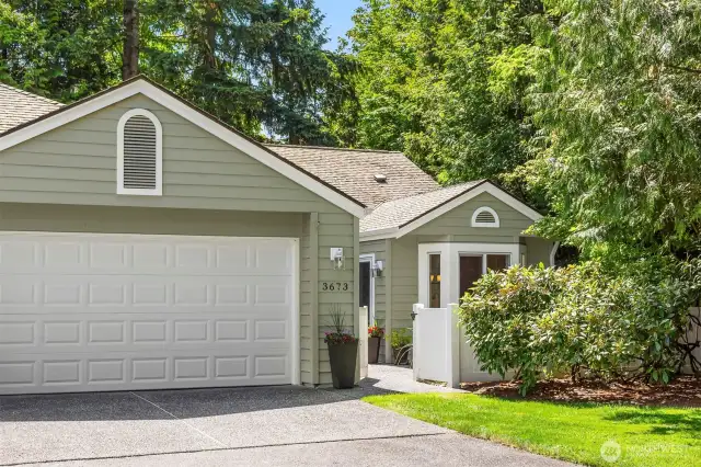 Private end unit with new siding. windows, and garage door - 2024