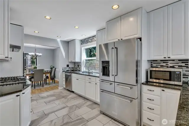 Stunning Kitchen with Tile Floors & Stainless Appliances.