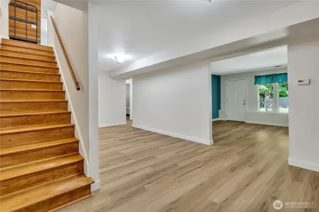 Stairs to the Basement, coat rack at the top of the stairs.