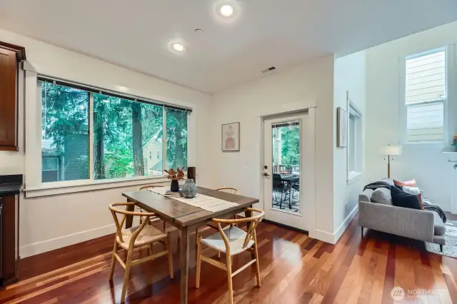Dining space will easily accommodate a dining set for 6. Adjacent covered deck allows for year round outdoor dining. Sun shade on deck for privacy.