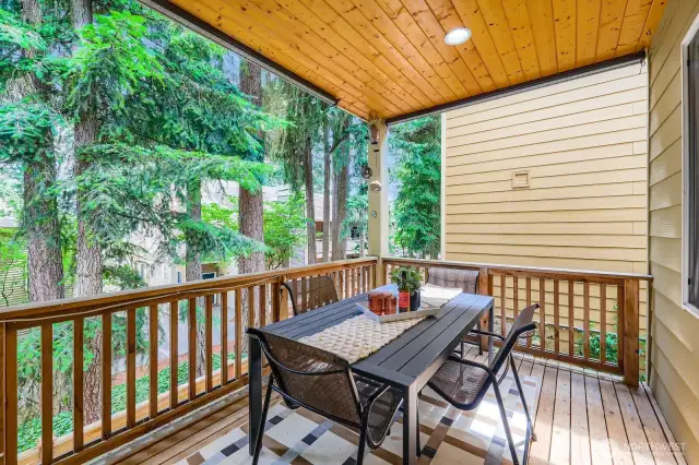 Covered deck off dining area is allows for year-round entertaining and outdoor dining.