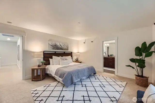 Main primary suite on 2nd floor with 5 pc bath including soaking tub and dual vanity. Walk-in closets with custom shelving.