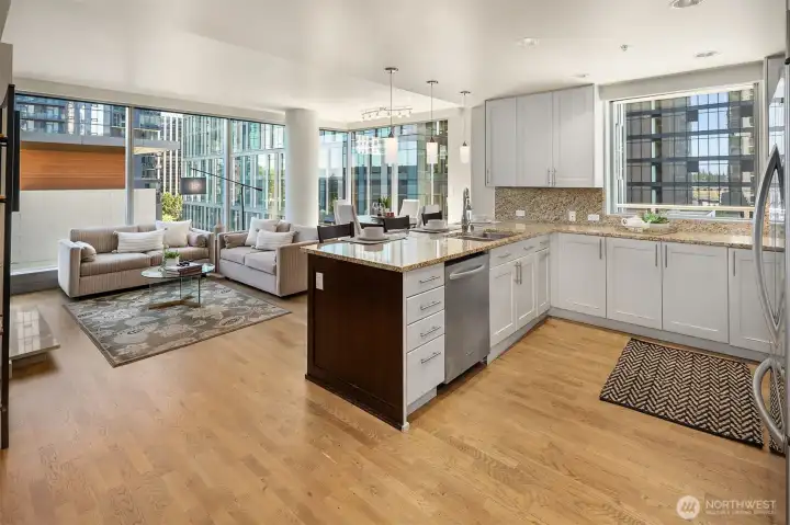 As you pass the entance hallway you are greeted by this light and bright great room home.