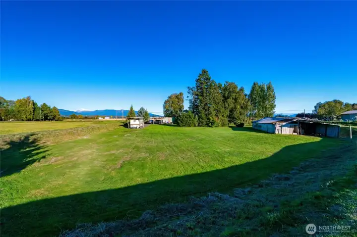 From the west dike of the property looking east. Old Barn is on the right.