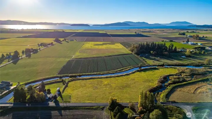 Soak in the beauty every day you drive out to this property.