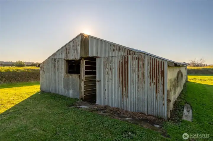 Barn in the back next to the river is grandfathered in to stay so you may update or improve it to fit your needs but if torn down, no structures are now allowed to be built within 200'ft of the river.