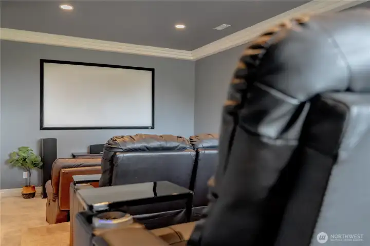 3-level seating, projector and surround sound.