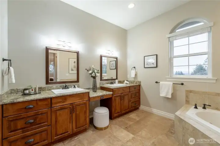 Primary bathroom, jetted tub, double vanity.