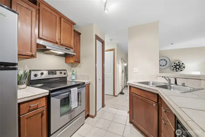 Tile countertops + durable LVP flooring