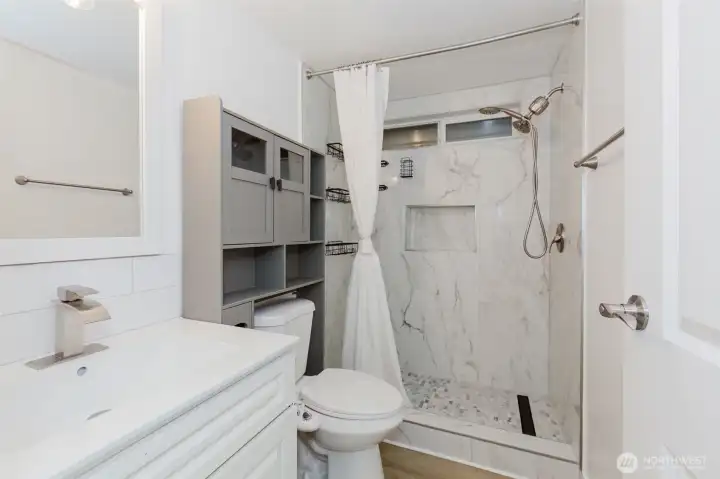 Fully remodeled guest bathroom.