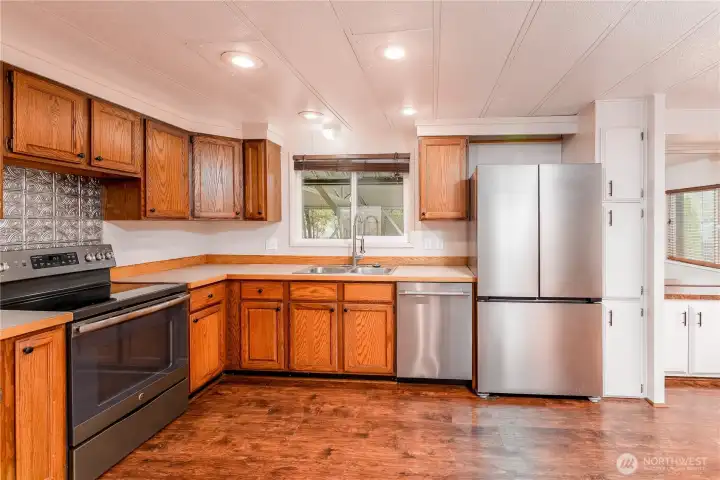 Kitchen with functional layout and ample cabinetry