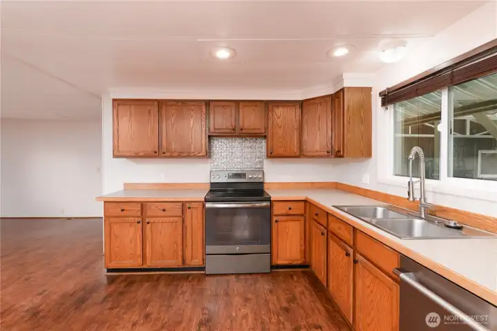Kitchen view emphasizing storage and workflow