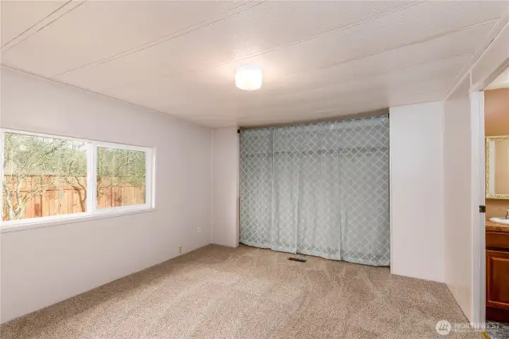 Primary bedroom with generous natural light