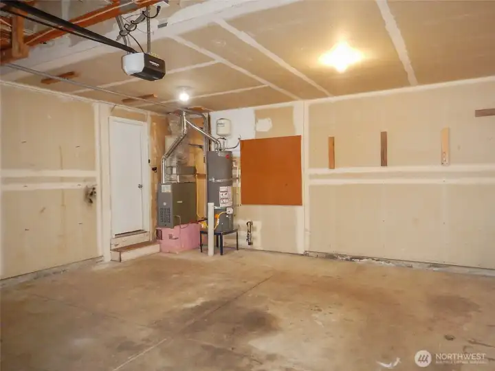 spacious garage with new door opener