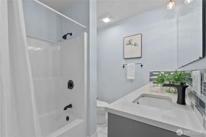 Updated guest bathroom with double vanity.