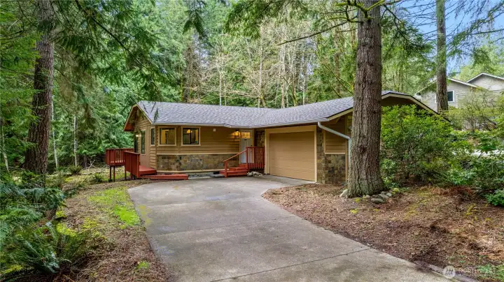 Exterior front of home with attached garage and driveway