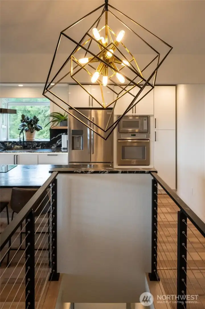 Stunning fixtures guide you to the lower level of this home.