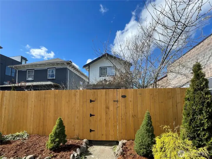 New cedar fence lines the perimeter of your home!