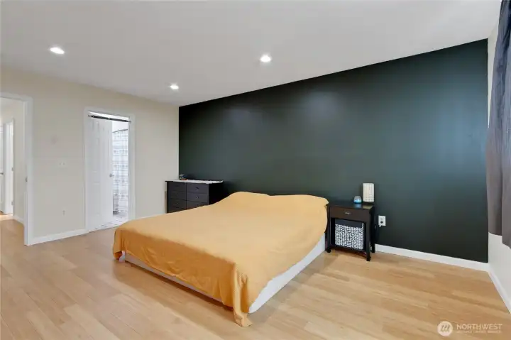 Bath en suite and plenty of lighting in this primary bedroom!
