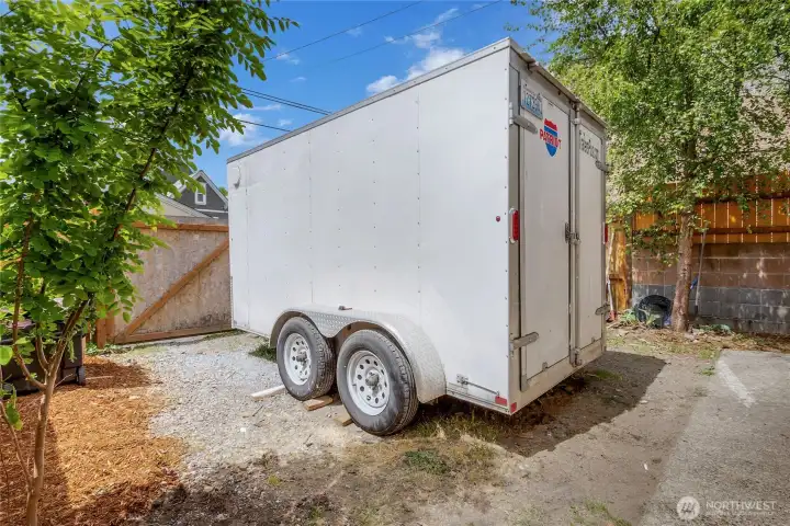 Trailer does not convey, double gates lead to your shop area, or the shop can be take down and the yard can be your new blank canvas to get creative!