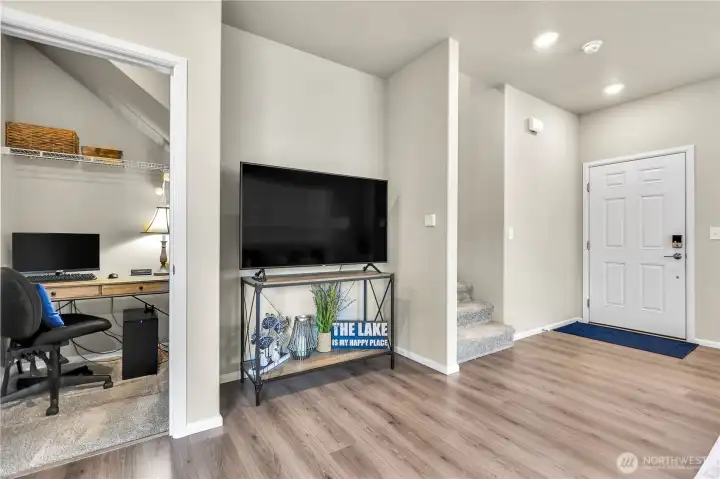 Seller utilized the spacious coat closet as a tucked away work station.