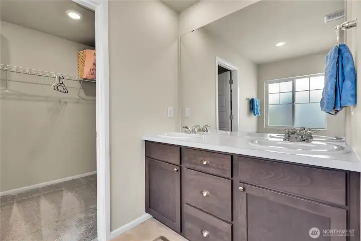 Your ensuite full bath awaits leading you to a walk-in closet that won't disappoint.