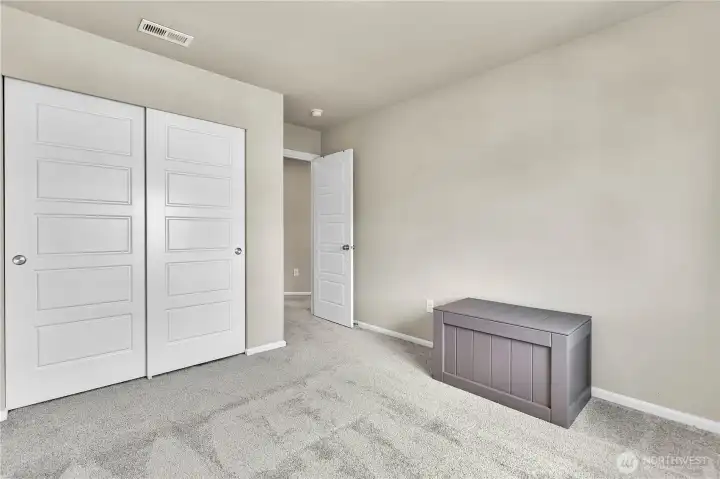 Well-appointed bedrooms with flexibility for guests or a home office.