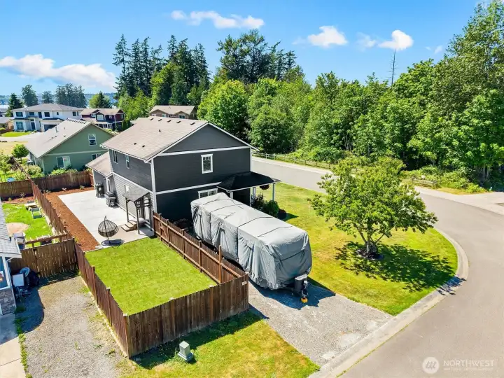 Corner lot + fenced yard + room for toys = a rare find!