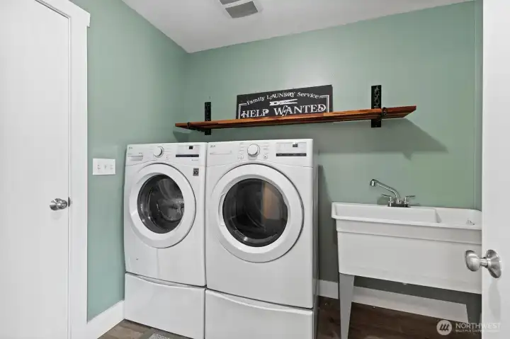 Everyday convenience starts here. Featuring a utility sink, storage space and included washer and dryer.