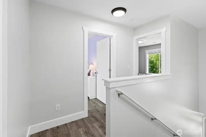 Three generous bedrooms and a two bathrooms are on the second floor.