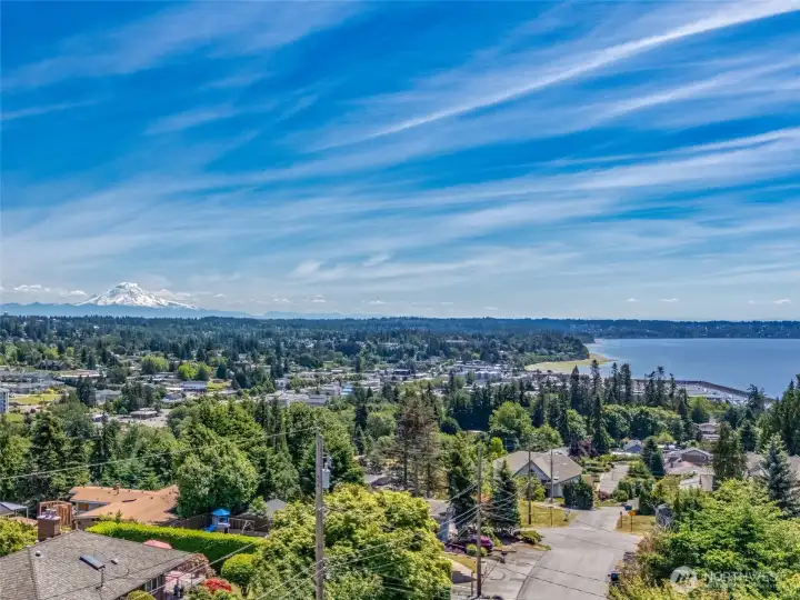 Just a few blocks down the road enjoy the full view of Puget Sound and Mt Rainier. Notice the Des Moines Marina in the foreground and the City of Des Moines to the left.