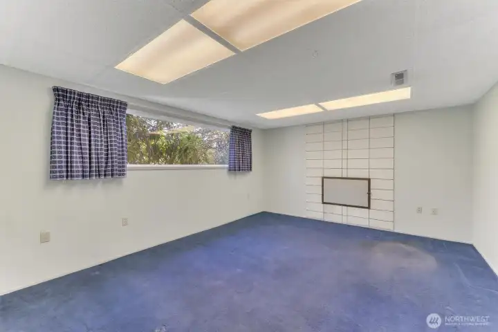 the downstairs features a large recroom with a wood burning fireplace.  It has plenty of space for all of your activities.
