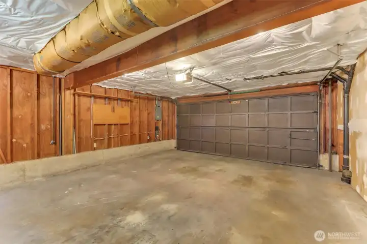 The 2 car garage is plenty deep and includes extra storage space.