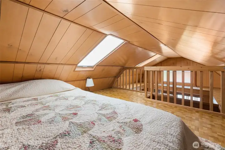 Large sleeping loft with an window that opens