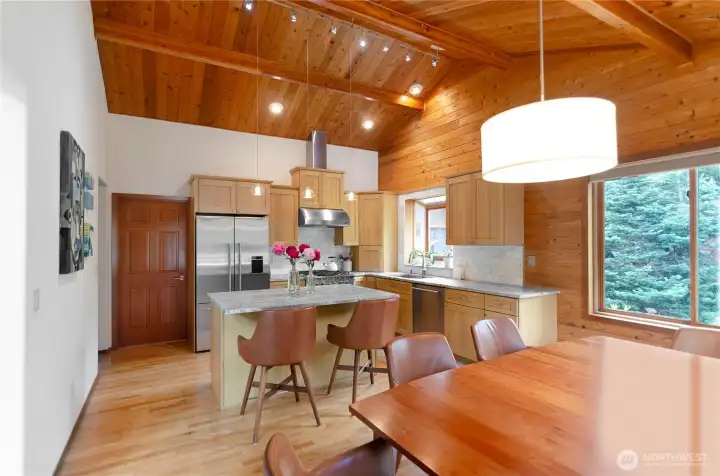 Fully remodeled kitchen with custom rift cut oak cabinetry and breakfast bar Fully remodeled kitchen with custom rift cut oak cabinetry and breakfast bar