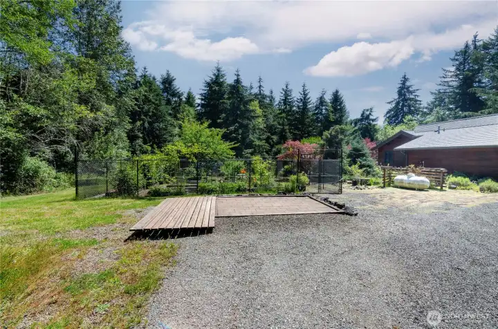 Dedicated RV spot, complete with it's own deck and patio. Organic garden ahead is deer proof. Dedicated RV spot, complete with it's own deck and patio. Organic garden ahead is deer proof.