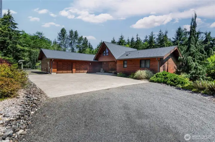 Spacious paved driveway. Attached over sized 2 car garage. Spacious paved driveway. Attached over sized 2 car garage.